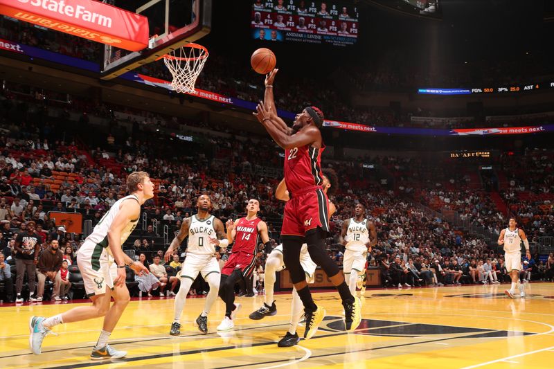 MIAMI, FL - NOVEMBER 26: Jimmy Butler #22 of the Miami Heat shoots the ball during the game against the Milwaukee Bucks during the Emirates NBA Cup game on November 26, 2024 at Kaseya Center in Miami, Florida. NOTE TO USER: User expressly acknowledges and agrees that, by downloading and or using this Photograph, user is consenting to the terms and conditions of the Getty Images License Agreement. Mandatory Copyright Notice: Copyright 2024 NBAE (Photo by Issac Baldizon/NBAE via Getty Images)