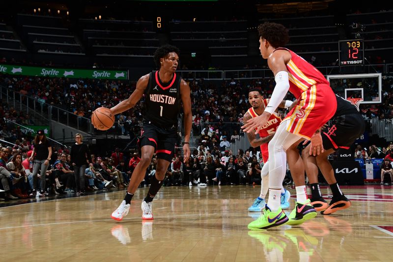 ATLANTA, GA - FEBRUARY 10: Amen Thompson #1 of the Houston Rockets dribbles the ball during the game against the Atlanta Hawks on February 10, 2024 at State Farm Arena in Atlanta, Georgia.  NOTE TO USER: User expressly acknowledges and agrees that, by downloading and/or using this Photograph, user is consenting to the terms and conditions of the Getty Images License Agreement. Mandatory Copyright Notice: Copyright 2024 NBAE (Photo by Scott Cunningham/NBAE via Getty Images)