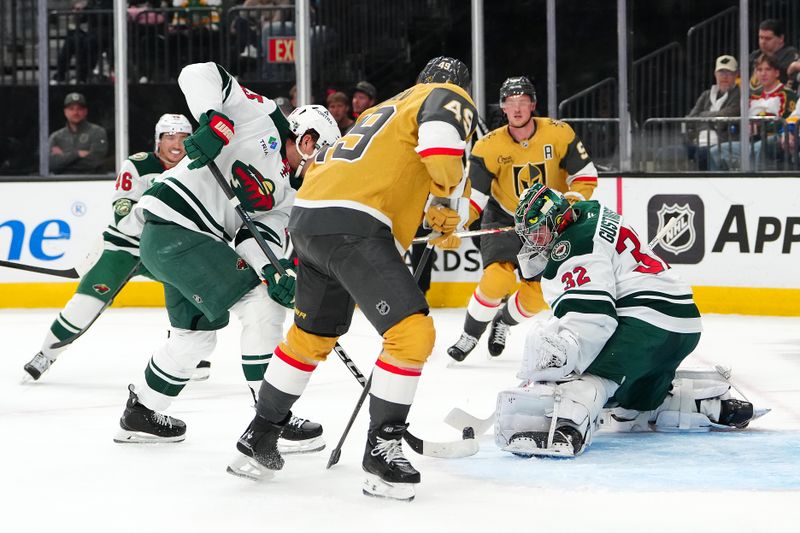 Mar 6, 2026; Las Vegas, Nevada, USA; Minnesota Wild goaltender Filip Gustavsson (32) makes a save against Vegas Golden Knights left wing Ivan Barbashev (49) during the second period at T-Mobile Arena. Mandatory Credit: Stephen R. Sylvanie-Imagn Images