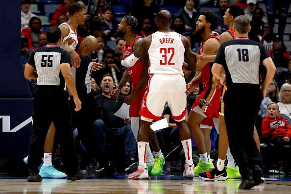 NEW ORLEANS, LOUISIANA - DECEMBER 23: Jose Alvarado #15 of the New Orleans Pelicans and Jabari Smith Jr. #10 of the Houston Rockets exchange in an altercation duirng the first quarter  of an NBA game at Smoothie King Center on December 23, 2023 in New Orleans, Louisiana. NOTE TO USER: User expressly acknowledges and agrees that, by downloading and or using this photograph, User is consenting to the terms and conditions of the Getty Images License Agreement. (Photo by Sean Gardner/Getty Images)