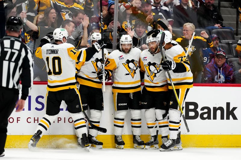 Mar 24, 2024; Denver, Colorado, USA; Pittsburgh Penguins right wing Bryan Rust (17) (center) celebrates his goal with left wing Drew O'Connor (10) and center Sidney Crosby (87) and defenseman Kris Letang (58) and defenseman Pierre-Olivier Joseph (73) in the first period against the Colorado Avalanche at Ball Arena. Mandatory Credit: Ron Chenoy-USA TODAY Sports