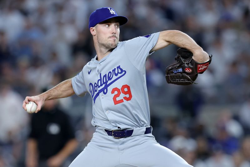 Jun 7, 2024; Bronx, New York, USA; Los Angeles Dodgers relief pitcher Michael Grove (29) pitches against the New York Yankees during the tenth inning at Yankee Stadium. Mandatory Credit: Brad Penner-USA TODAY Sports