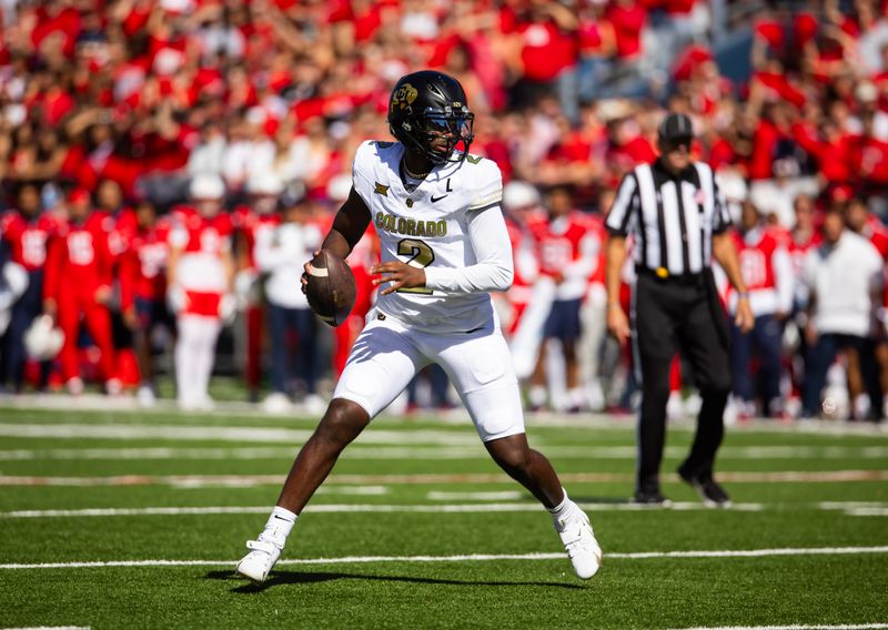 Oct 19, 2024; Tucson, Arizona, USA; Colorado Buffalos quarterback Shedeur Sanders (2) against the Arizona Wildcats in the first half at Arizona Stadium. Mandatory Credit: Mark J. Rebilas-Imagn Images