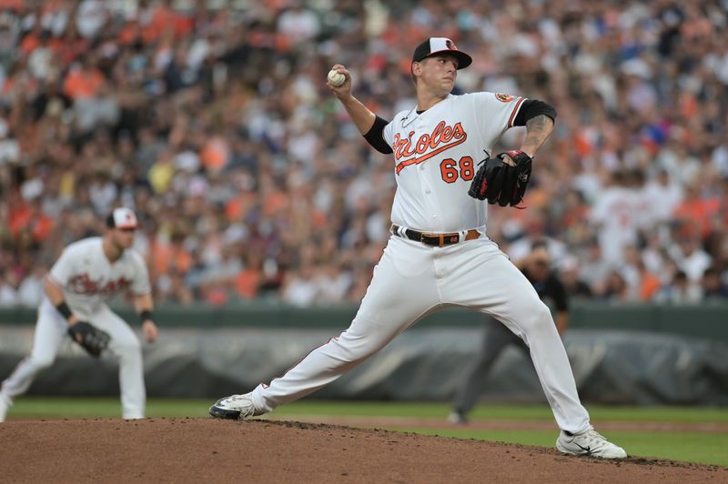 Jul 29, 2023; Baltimore, Maryland, USA;  Baltimore Orioles starting pitcher Tyler Wells (68) throws a second inning pitch against the New York Yankees at Oriole Park at Camden Yards. Mandatory Credit: Tommy Gilligan-USA TODAY Sports