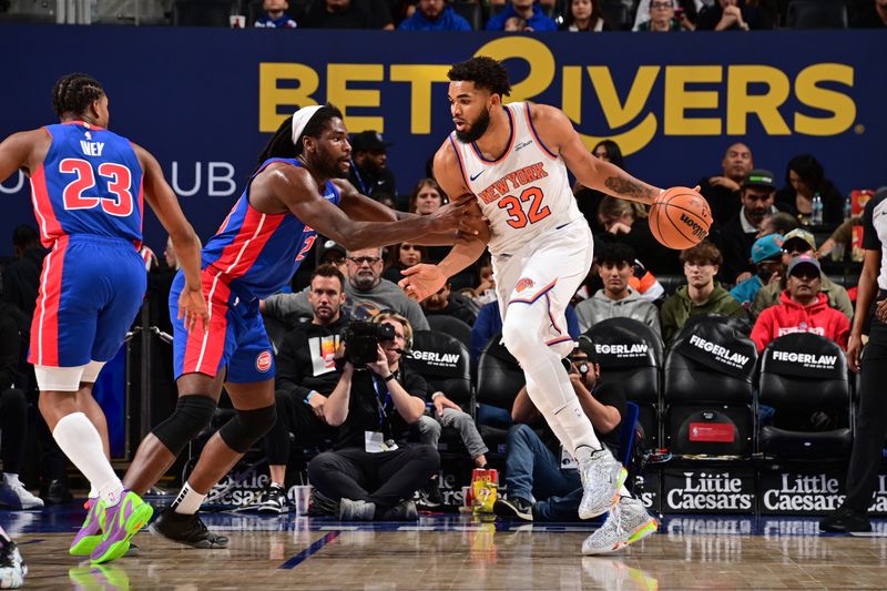 DETROIT, MI - NOVEMBER 1: Karl-Anthony Towns #32 of the New York Knicks handles the ball during the game against the Detroit Pistons on November 1, 2024 at Little Caesars Arena in Detroit, Michigan. NOTE TO USER: User expressly acknowledges and agrees that, by downloading and/or using this photograph, User is consenting to the terms and conditions of the Getty Images License Agreement. Mandatory Copyright Notice: Copyright 2024 NBAE (Photo by Chris Schwegler/NBAE via Getty Images)