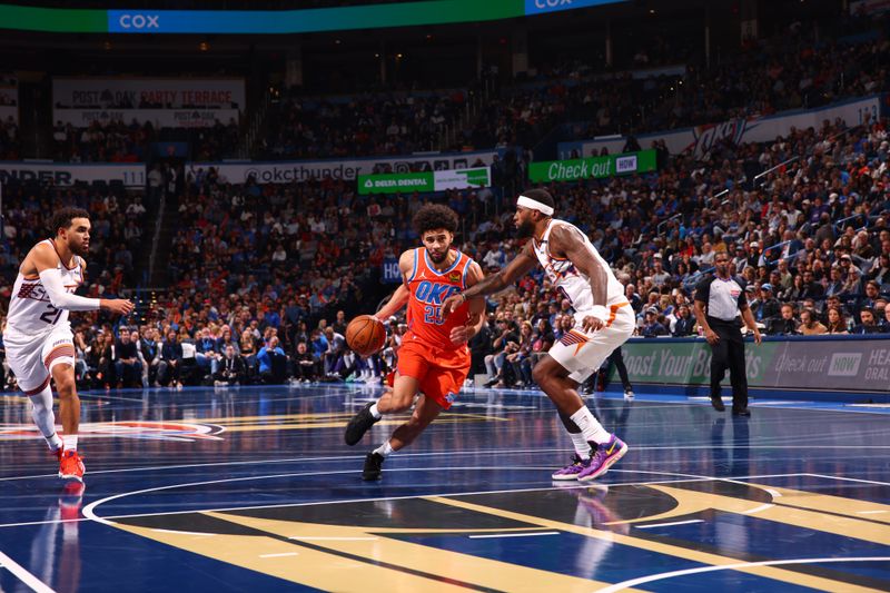 OKLAHOMA CITY, OK - NOVEMBER 15: Ajay Mitchell #25 of the Oklahoma City Thunder drives to the basket during the game against the Phoenix Suns during the Emirates NBA Cup game on November 15, 2024 at Paycom Center in Oklahoma City, Oklahoma. NOTE TO USER: User expressly acknowledges and agrees that, by downloading and or using this photograph, User is consenting to the terms and conditions of the Getty Images License Agreement. Mandatory Copyright Notice: Copyright 2024 NBAE (Photo by Zach Beeker/NBAE via Getty Images)