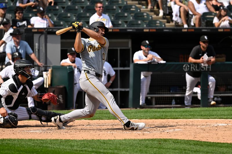 Jul 13, 2024; Chicago, Illinois, USA;  Pittsburgh Pirates outfielder Bryan Reynolds (10) hits an two RBI single against the Chicago White Sox during the ninth inning at Guaranteed Rate Field. Mandatory Credit: Matt Marton-USA TODAY Sports