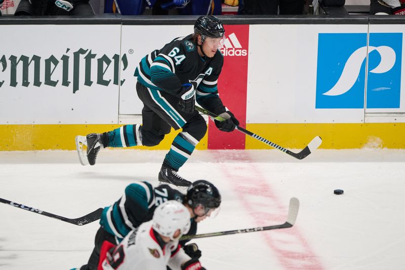 Mar 9, 2024; San Jose, California, USA; San Jose Sharks center Mikael Granlund (64) skates with the puck against the Ottawa Senators during the third period at SAP Center at San Jose. Mandatory Credit: Robert Edwards-USA TODAY Sports