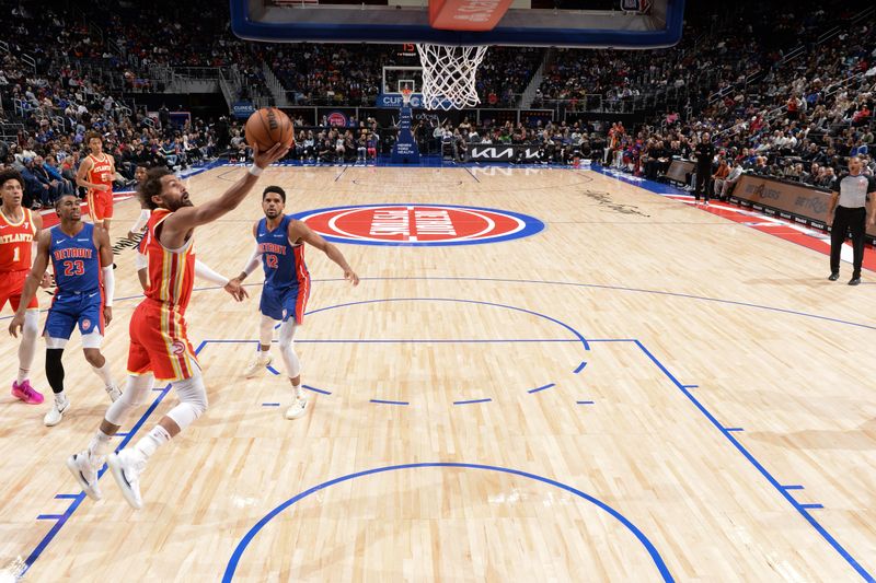 DETROIT, MI - NOVEMBER 8: Trae Young #11 of the Atlanta Hawks shoots the ball during the game against the Detroit Pistons on November  8, 2024 at Little Caesars Arena in Detroit, Michigan. NOTE TO USER: User expressly acknowledges and agrees that, by downloading and/or using this photograph, User is consenting to the terms and conditions of the Getty Images License Agreement. Mandatory Copyright Notice: Copyright 2024 NBAE (Photo by Chris Schwegler/NBAE via Getty Images)