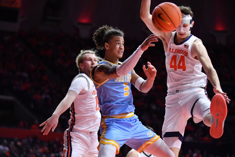 Dec 29, 2025; Champaign, Illinois, USA;  Southern University Jaguars guard Cam Amboree (3) passes the ball by Illinois Fighting Illini forward Zvonimir Ivisic (44) during the second half at State Farm Center. Mandatory Credit: Ron Johnson-Imagn Images