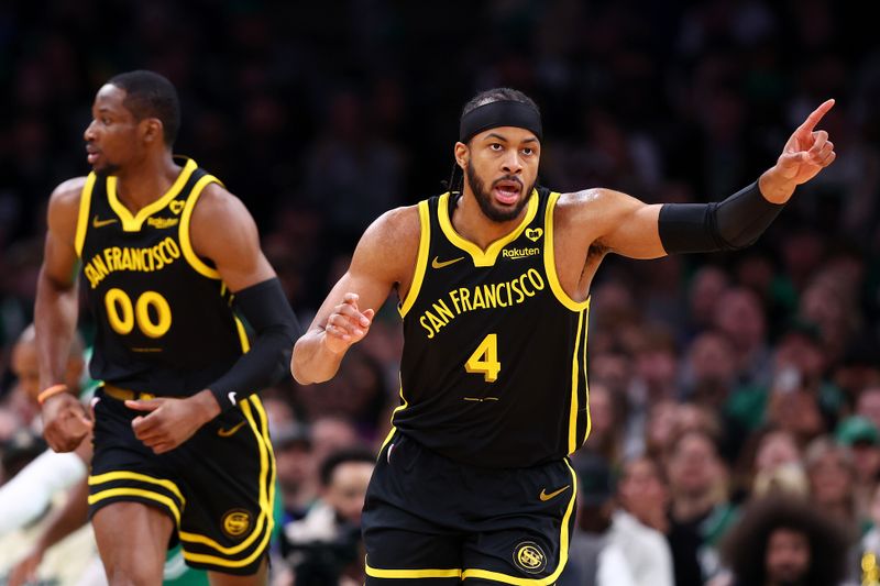 BOSTON, MASSACHUSETTS - MARCH 03: Moses Moody #4 of the Golden State Warriors celebrates after scoring against the Boston Celtics during the first quarter at TD Garden on March 03, 2024 in Boston, Massachusetts. NOTE TO USER: User expressly acknowledges and agrees that, by downloading and or using this photograph, user is consenting to the terms and conditions of the Getty Images License Agreement.  (Photo by Maddie Meyer/Getty Images)