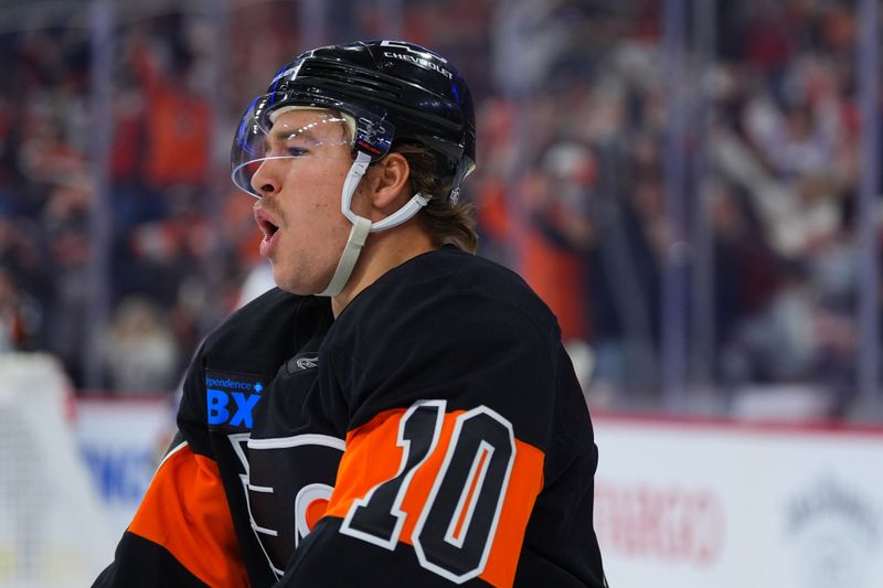 Nov 29, 2024; Philadelphia, Pennsylvania, USA; Philadelphia Flyers right wing Bobby Brink (10) reacts after scoring a goal against the New York Rangers in the first period at Wells Fargo Center. Mandatory Credit: Kyle Ross-Imagn Images