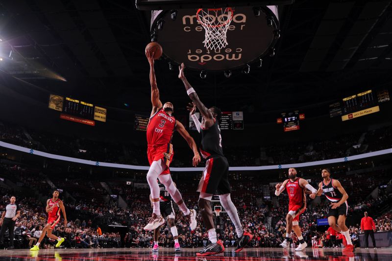 PORTLAND, OR - APRIL 9: CJ McCollum #3 of the New Orleans Pelicans shoots the ball during the game against the Portland Trail Blazers on April 9, 2024 at the Moda Center Arena in Portland, Oregon. NOTE TO USER: User expressly acknowledges and agrees that, by downloading and or using this photograph, user is consenting to the terms and conditions of the Getty Images License Agreement. Mandatory Copyright Notice: Copyright 2024 NBAE (Photo by Cameron Browne/NBAE via Getty Images)