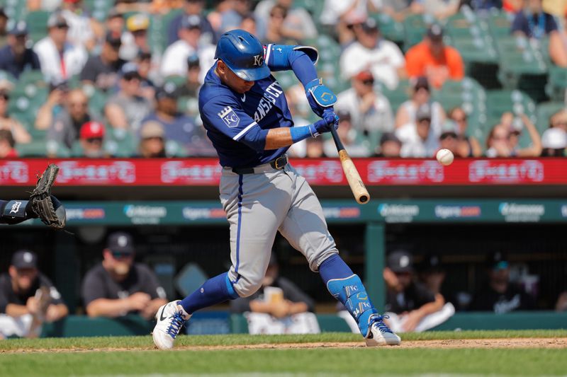 Aug 4, 2024; Detroit, Michigan, USA;  Kansas City Royals catcher Freddy Fermin (34) hits a single in the ninth inning against the Detroit Tigers at Comerica Park. Mandatory Credit: Rick Osentoski-USA TODAY Sports