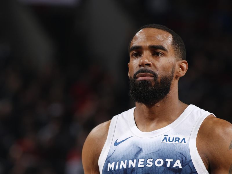 PORTLAND, OR - FEBRUARY 15: Mike Conley #10 of the Minnesota Timberwolves prepares to shoot a free throw during the game against the Portland Trail Blazers on February 15, 2024 at the Moda Center Arena in Portland, Oregon. NOTE TO USER: User expressly acknowledges and agrees that, by downloading and or using this photograph, user is consenting to the terms and conditions of the Getty Images License Agreement. Mandatory Copyright Notice: Copyright 2024 NBAE (Photo by Cameron Browne/NBAE via Getty Images)