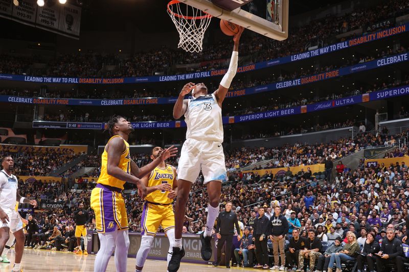 LOS ANGELES, CA - FEBRUARY 27: Jaden McDaniels #3 of the Minnesota Timberwolves shoots the ball during the game against the Los Angeles Lakers on February 27, 2025 at Crypto.Com Arena in Los Angeles, California. NOTE TO USER: User expressly acknowledges and agrees that, by downloading and/or using this Photograph, user is consenting to the terms and conditions of the Getty Images License Agreement. Mandatory Copyright Notice: Copyright 2025 NBAE (Photo by Nathaniel S. Butler/NBAE via Getty Images)