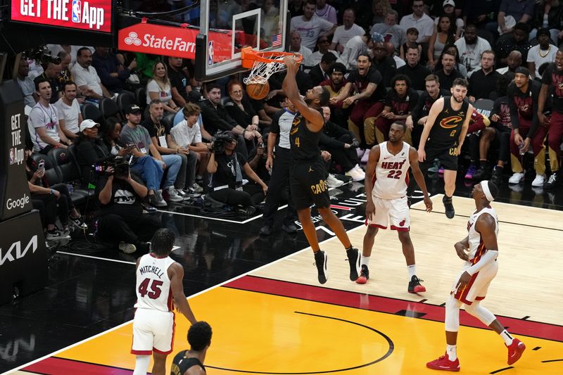 MIAMI, FL - APRIL 26: Evan Mobley #4 of the Cleveland Cavaliers dunks the ball during the game against the Miami Heat during Round 1 Game 3 of the 2025 NBA Playoffs on April 26, 2025 at Kaseya Center in Miami, Florida. NOTE TO USER: User expressly acknowledges and agrees that, by downloading and or using this Photograph, user is consenting to the terms and conditions of the Getty Images License Agreement. Mandatory Copyright Notice: Copyright 2025 NBAE(Photo by Eric Espada/NBAE via Getty Images)