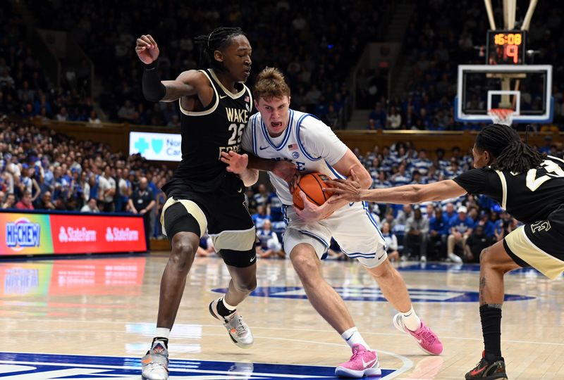 Mar 3, 2025; Durham, North Carolina, USA;  Duke Blue Devils forward Cooper Flagg (2) drives to the basket as Wake Forest Demon Deacons forward Tre'Von Spillers (25) defends during the second half at Cameron Indoor Stadium.  The Blue Devils won 93-60. Mandatory Credit: Rob Kinnan-Imagn Images