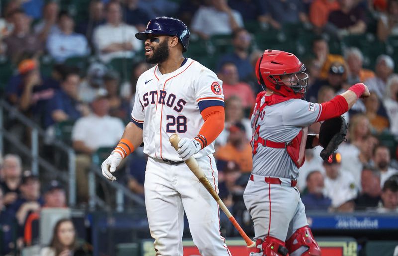 May 22, 2024; Houston, Texas, USA; Houston Astros first baseman Jon Singleton (28) reacts after striking out during the ninth inning against the Los Angeles Angels at Minute Maid Park. Mandatory Credit: Troy Taormina-USA TODAY Sports