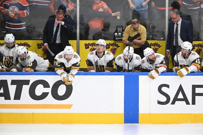 May 12, 2025; Edmonton, Alberta, CAN; Vegas Golden Knights Head Coach Bruce Cassidy is seen on the players bench with center Nicolas Roy (10) defenseman Zach Whitecloud (2) Knights defenseman Nicolas Hague (14) and Knights defenseman Alex Pietrangelo (7) as they play the Edmonton Oilers during the third period in game three of the second round of the 2025 Stanley Cup Playoffs at Rogers Place. Mandatory Credit: Walter Tychnowicz-Imagn Images