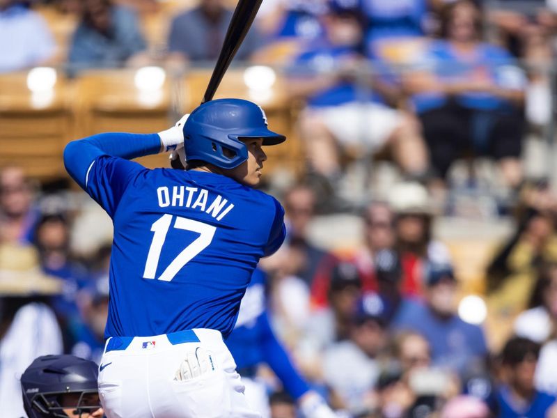 Mar 3, 2024; Phoenix, Arizona, USA; Los Angeles Dodgers designated hitter Shohei Ohtani against the Colorado Rockies during a spring training game at Camelback Ranch-Glendale. Mandatory Credit: Mark J. Rebilas-USA TODAY Sports