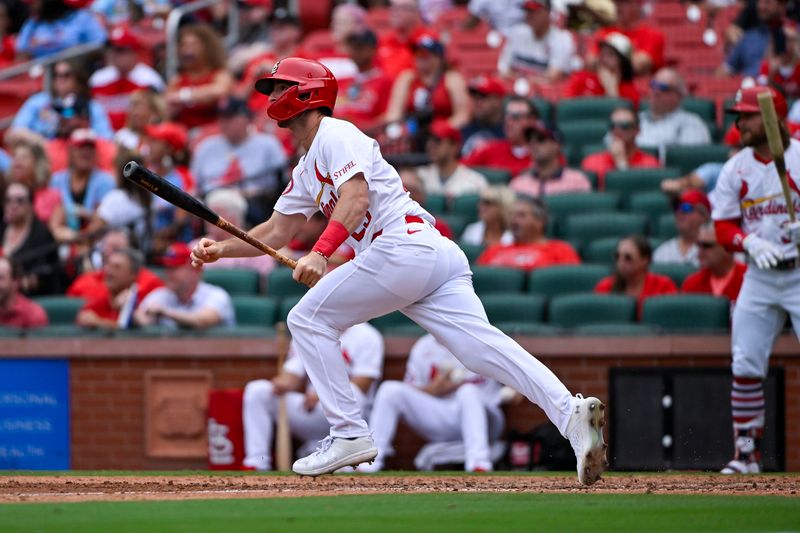 Sep 12, 2024; St. Louis, Missouri, USA;  St. Louis Cardinals second baseman Thomas Saggese (25) hits a one run single for his first Major League rbi during the eighth inning against the Cincinnati Reds at Busch Stadium. Mandatory Credit: Jeff Curry-Imagn Images