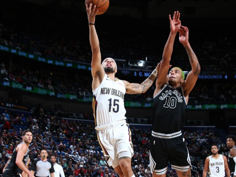 NEW ORLEANS, LA - DECEMBER 22: Jose Alvarado #15 of the New Orleans Pelicans drives to the basket during the game against the San Antonio Spurs on December 22, 2022 at the Smoothie King Center in New Orleans, Louisiana. NOTE TO USER: User expressly acknowledges and agrees that, by downloading and or using this Photograph, user is consenting to the terms and conditions of the Getty Images License Agreement. Mandatory Copyright Notice: Copyright 2022 NBAE (Photo by Layne Murdoch Jr./NBAE via Getty Images)