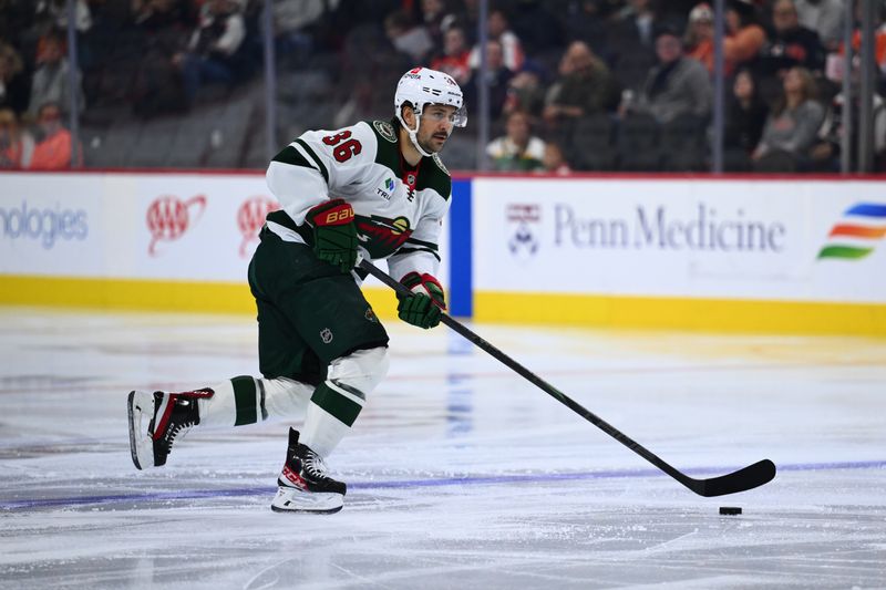 Oct 26, 2024; Philadelphia, Pennsylvania, USA; Minnesota Wild right wing Mats Zuccarello (36) controls the puck against the Philadelphia Flyers in the second period at Wells Fargo Center. Mandatory Credit: Kyle Ross-Imagn Images