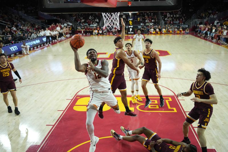 Feb 15, 2025; Los Angeles, California, USA; Southern California Trojans forward Rashaun Agee (12) shoots the ball against the Minnesota Golden Gophers in the first half at Galen Center. Mandatory Credit: Kirby Lee-Imagn Images