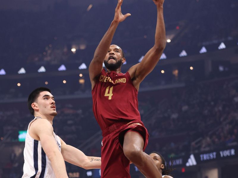 CLEVELAND, OH - FEBRUARY 23: Evan Mobley #4 of the Cleveland Cavaliers drives to the basket during the game against the Memphis Grizzlies on February 23, 2025 at Rocket Arena in Cleveland, Ohio. NOTE TO USER: User expressly acknowledges and agrees that, by downloading and/or using this Photograph, user is consenting to the terms and conditions of the Getty Images License Agreement. Mandatory Copyright Notice: Copyright 2025 NBAE (Photo by Joe Murphy/NBAE via Getty Images)