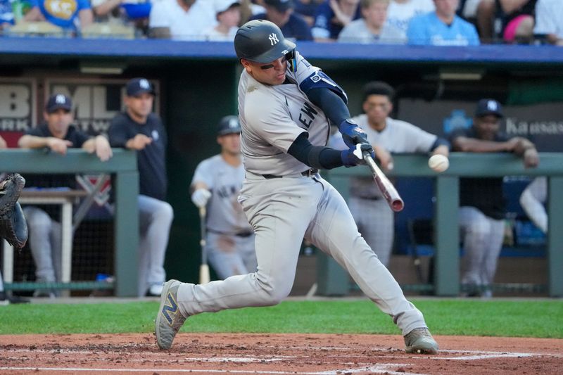 Jun 12, 2024; Kansas City, Missouri, USA;  New York Yankees catcher Jose Trevino (39) hits a three run home run against the New York Yankees in the first inning at Kauffman Stadium. Mandatory Credit: Denny Medley-USA TODAY Sports