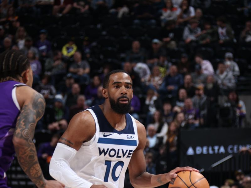 SALT LAKE CITY, UT - MARCH 18: Mike Conley #10 of the Minnesota Timberwolves handles the ball during the game against the Utah Jazz on March 18, 2024 at Delta Center in Salt Lake City, Utah. NOTE TO USER: User expressly acknowledges and agrees that, by downloading and or using this Photograph, User is consenting to the terms and conditions of the Getty Images License Agreement. Mandatory Copyright Notice: Copyright 2024 NBAE (Photo by Melissa Majchrzak/NBAE via Getty Images)