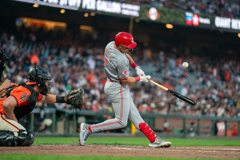 May 10, 2024; San Francisco, California, USA; Cincinnati Reds first baseman Spencer Steer (7) hits an RBI single against the San Francisco Giants third inning at Oracle Park. Mandatory Credit: Neville E. Guard-USA TODAY Sports