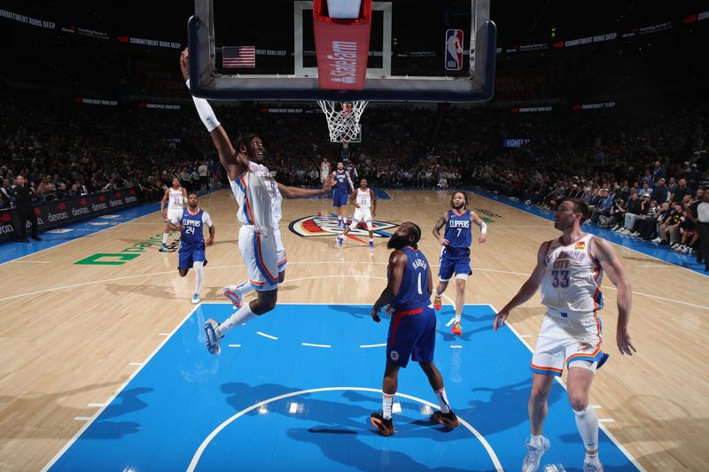 OKLAHOMA CITY, OK - FEBRUARY 22:  Jalen Williams #8 of the Oklahoma City Thunder drives to the basket during the game against the LA Clippers on February 22SF, 2024 at Paycom Arena in Oklahoma City, Oklahoma. NOTE TO USER: User expressly acknowledges and agrees that, by downloading and or using this photograph, User is consenting to the terms and conditions of the Getty Images License Agreement. Mandatory Copyright Notice: Copyright 2024 NBAE (Photo by Zach Beeker/NBAE via Getty Images)