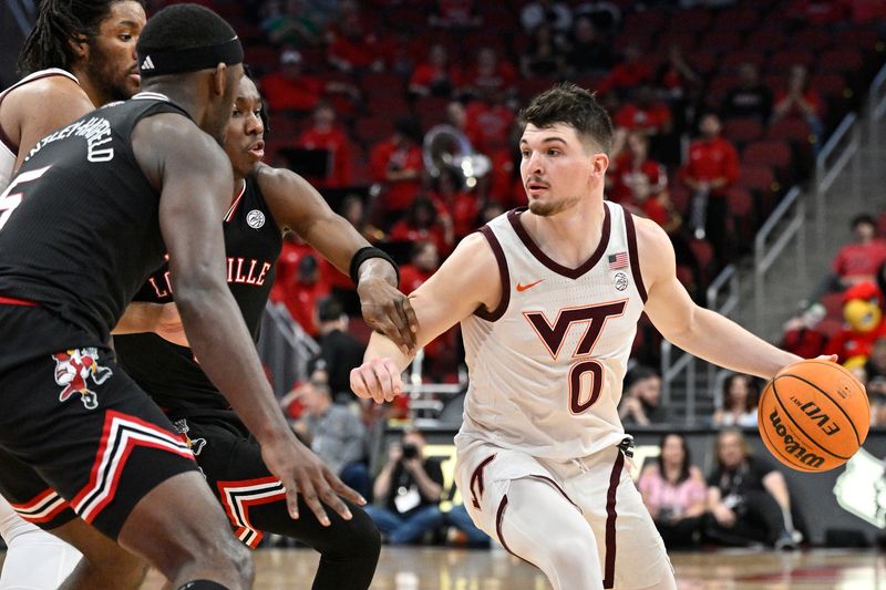 Mar 5, 2024; Louisville, Kentucky, USA; Virginia Tech Hokies guard Hunter Cattoor (0) dribbles against Louisville Cardinals guard Mike James (0) during the first half at KFC Yum! Center. Virginia Tech defeated Louisville 80-64. Mandatory Credit: Jamie Rhodes-USA TODAY Sports