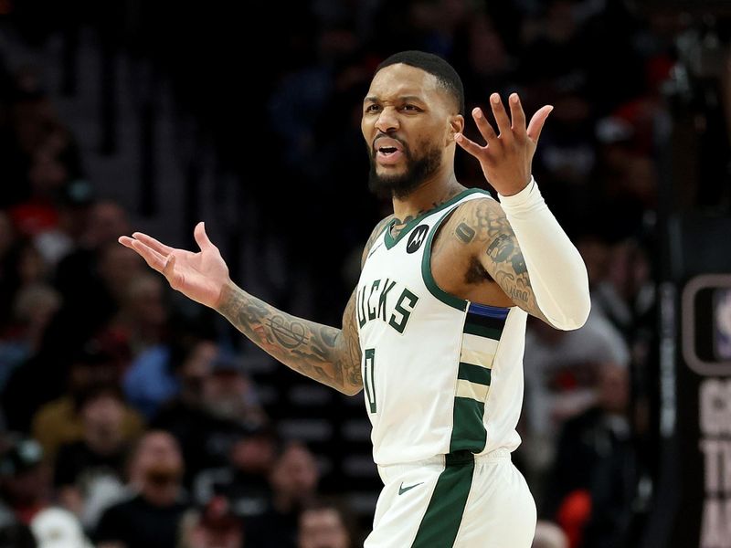 PORTLAND, OREGON - JANUARY 31: Damian Lillard #0 of the Milwaukee Bucks reacts during the second quarter against the Portland Trail Blazers at Moda Center on January 31, 2024 in Portland, Oregon. (Photo by Steph Chambers/Getty Images)