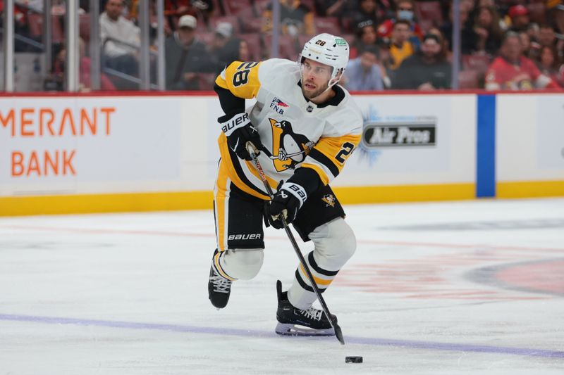 Oct 23, 2025; Sunrise, Florida, USA; Pittsburgh Penguins defenseman Parker Wotherspoon (28) moves the puck against the Florida Panthers during the first period at Amerant Bank Arena. Mandatory Credit: Sam Navarro-Imagn Images