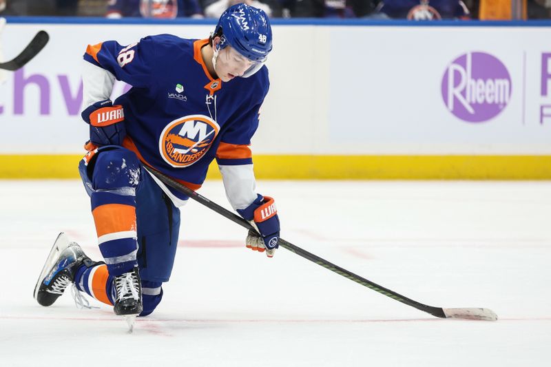 Nov 22, 2025; Elmont, New York, USA;  New York Islanders defenseman Matthew Schaefer (48) reacts after failing to score in the second period against the St. Louis Blues at UBS Arena. Mandatory Credit: Wendell Cruz-Imagn Images