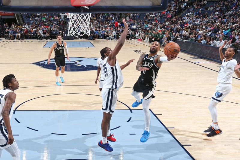 MEMPHIS, TN - FEBRUARY 15: Damian Lillard #0 of the Milwaukee Bucks drives to the basket during the game against the Memphis Grizzlies on February 15, 2024 at FedExForum in Memphis, Tennessee. NOTE TO USER: User expressly acknowledges and agrees that, by downloading and or using this photograph, User is consenting to the terms and conditions of the Getty Images License Agreement. Mandatory Copyright Notice: Copyright 2024 NBAE (Photo by Stephen Gosling/NBAE via Getty Images)