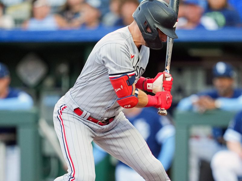 Jul 28, 2023; Kansas City, Missouri, USA; Minnesota Twins second baseman Edouard Julien (47) is hit by a pitch during the first inning against the Kansas City Royals at Kauffman Stadium. Mandatory Credit: Jay Biggerstaff-USA TODAY Sports