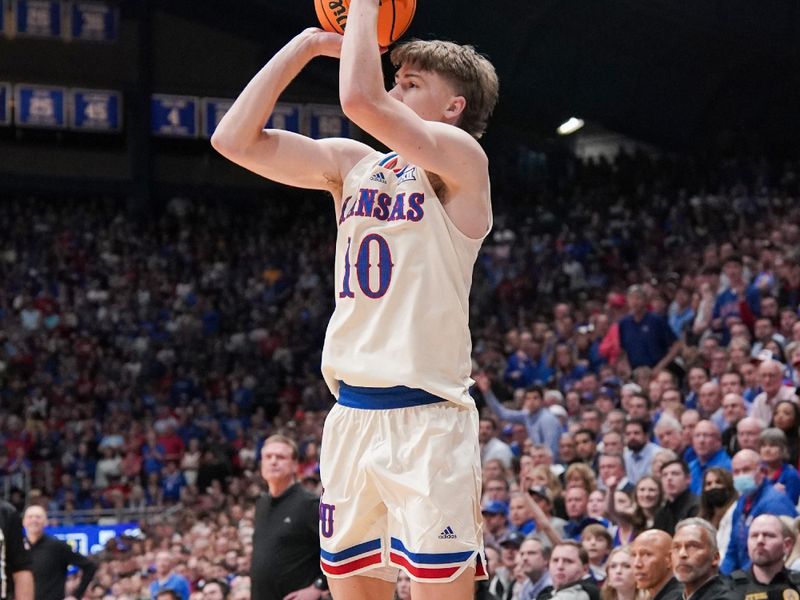 Feb 27, 2024; Lawrence, Kansas, USA; Kansas Jayhawks guard Johnny Furphy (10) shoots a three point attempt against the Brigham Young Cougars during the second half at Allen Fieldhouse. Mandatory Credit: Denny Medley-USA TODAY Sports