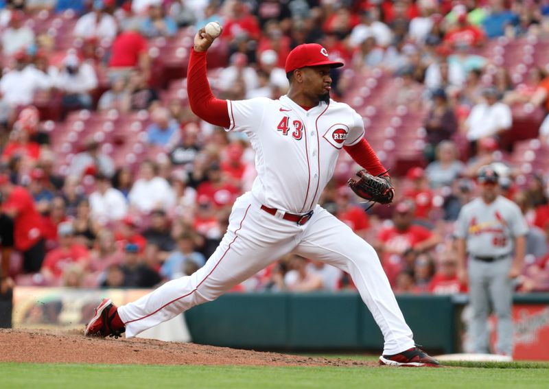 Sep 10, 2023; Cincinnati, Ohio, USA; Cincinnati Reds relief pitcher Alexis Diaz (43) throws against the St. Louis Cardinals during the ninth inning at Great American Ball Park. Mandatory Credit: David Kohl-USA TODAY Sports