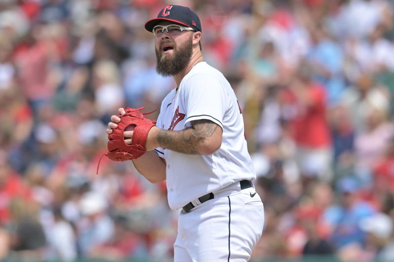 May 28, 2023; Cleveland, Ohio, USA; Cleveland Guardians starting pitcher Hunter Gaddis (33) reacts after giving up a home run to St. Louis Cardinals left fielder Alec Burleson (not pictured) during the fifth inning at Progressive Field. Mandatory Credit: Ken Blaze-USA TODAY Sports