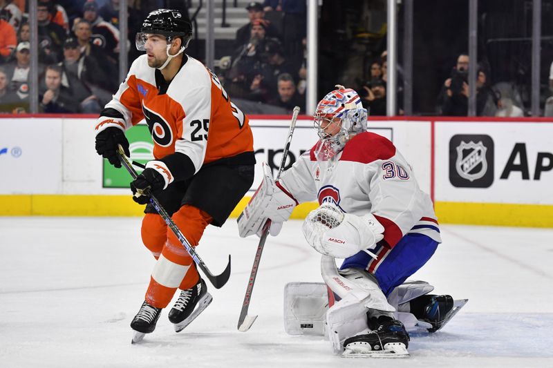 Jan 10, 2024; Philadelphia, Pennsylvania, USA; Philadelphia Flyers center Ryan Poehling (25) and Montreal Canadiens goaltender Cayden Primeau (30) battle for position during the first period at Wells Fargo Center. Mandatory Credit: Eric Hartline-USA TODAY Sports