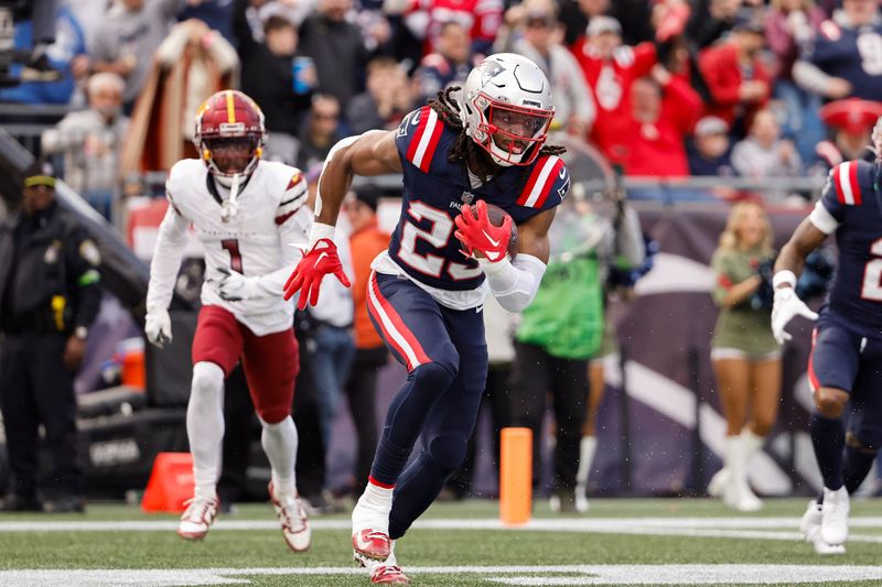 New England Patriots safety Kyle Dugger returns an interception against the Washington Commanders during an NFL football game at Gillette Stadium, Sunday Nov. 5, 2023 in Foxborough, Mass. (Winslow Townson/AP Images for Panini)