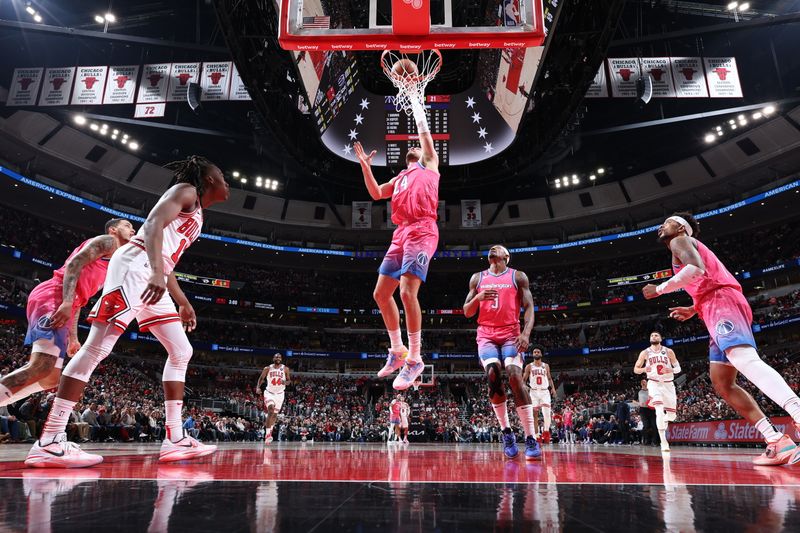 CHICAGO, IL - FEBRUARY 26: Corey Kispert #24 of the Washington Wizards drives to the basket during the game against the Chicago Bulls on February 26, 2023 at United Center in Chicago, Illinois. NOTE TO USER: User expressly acknowledges and agrees that, by downloading and or using this photograph, User is consenting to the terms and conditions of the Getty Images License Agreement. Mandatory Copyright Notice: Copyright 2023 NBAE (Photo by Jeff Haynes/NBAE via Getty Images)