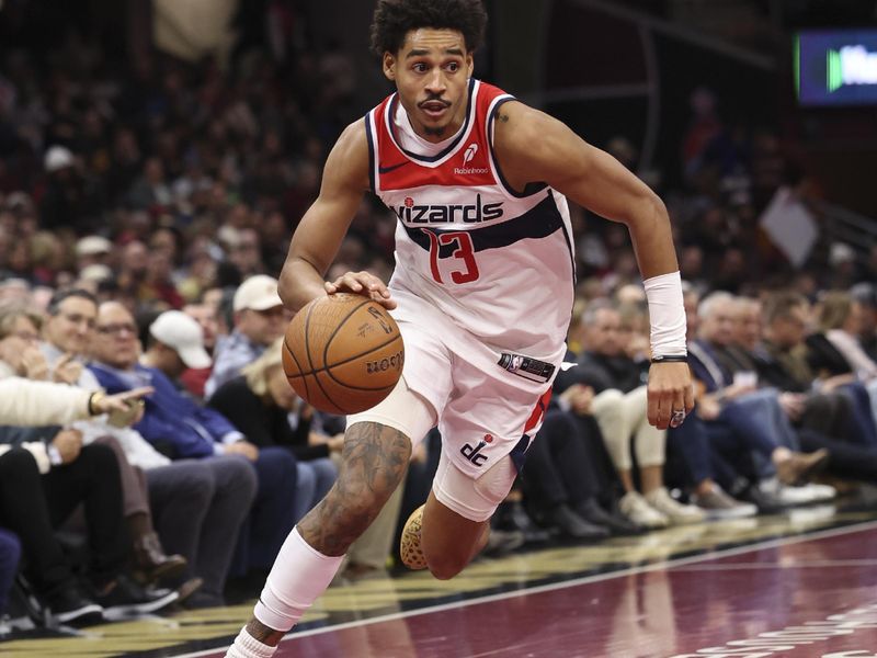 CLEVELAND, OH - DECEMBER 3: Jordan Poole #13 of the Washington Wizards drives to the basket during the game against the Cleveland Cavaliers in the NBA Cup on December 3, 2024 at Rocket Mortgage FieldHouse in Cleveland, Ohio. NOTE TO USER: User expressly acknowledges and agrees that, by downloading and/or using this Photograph, user is consenting to the terms and conditions of the Getty Images License Agreement. Mandatory Copyright Notice: Copyright 2024 NBAE (Photo by  Lauren Leigh Bacho/NBAE via Getty Images)