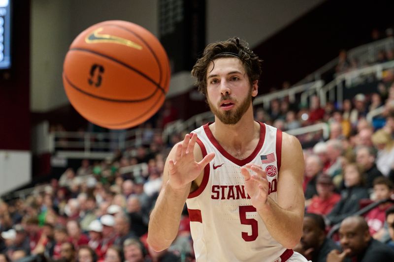 Dec 30, 2025; Stanford, California, USA; Stanford Cardinal guard Benny Gealer (5) catches a pass against the Notre Dame Fighting Irish during the second half at Maples Pavilion. Mandatory Credit: Robert Edwards-Imagn Images