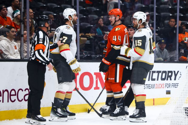 Nov 13, 2024; Anaheim, California, USA; Anaheim Ducks left wing Ross Johnston (44) and Vegas Golden Knights defenseman Alex Pietrangelo (7) interact during the second period of a hockey game at Honda Center. Mandatory Credit: Jessica Alcheh-Imagn Images