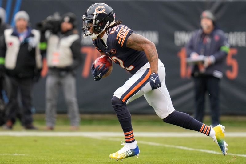 Chicago Bears wide receiver Velus Jones Jr. (12) carries the ball during the first half of an NFL football game against the Detroit Lions Sunday, Dec. 10, 2023, in Chicago. The Bears won 28-13. (AP Photo/Erin Hooley)